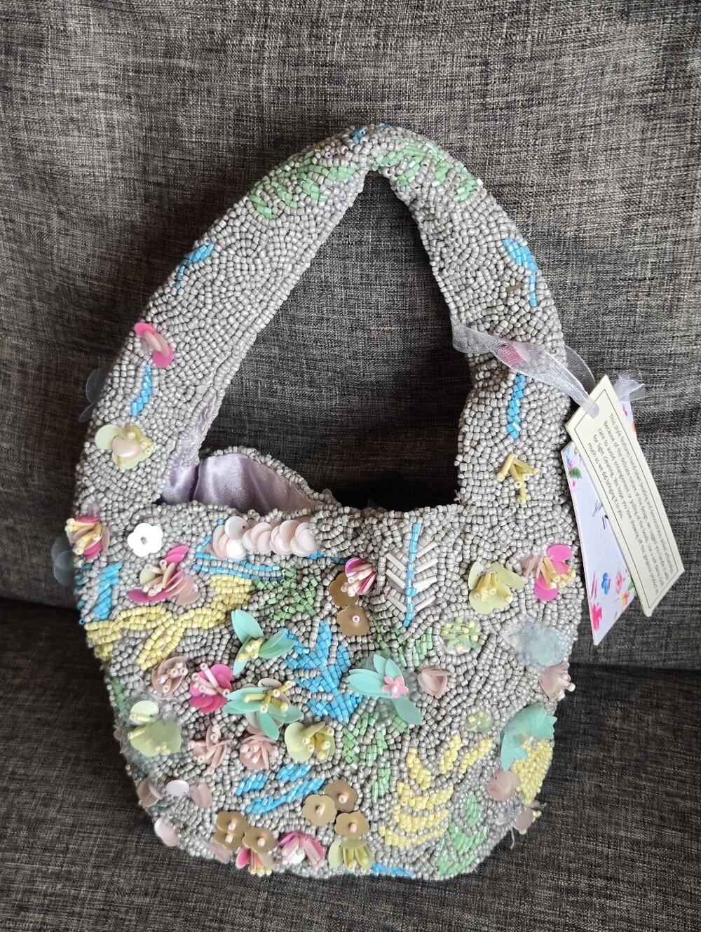 MADE IN INDIA: Gray Beaded Bag With Floral Embellishments